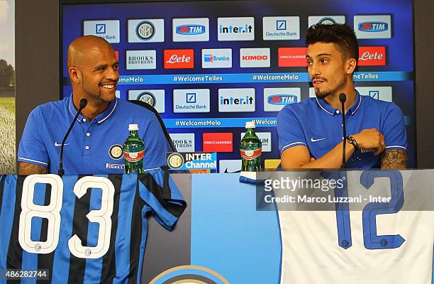 Felipe Melo and Alex Telles new signings for FC Internazionale Milano speak to the media during a press conference at the club's training ground on...