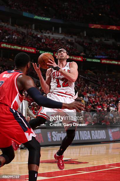 Kirk Hinrich of the Chicago Bulls shoots against the Washington Wizards during Game 1 of the Eastern Conference Quarterfinals on April 20, 2014 at...