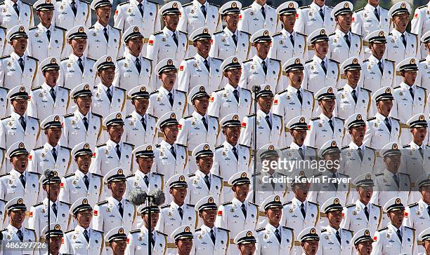 Members of a Chinese military choir sing near Tiananmen Square and the Forbidden City during a military parade on September 3, 2015 in Beijing,...
