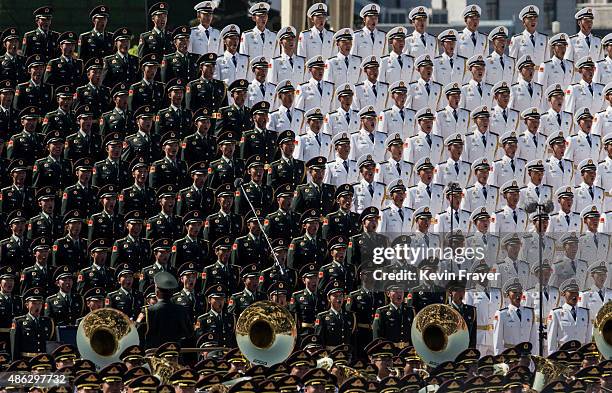 Members of a Chinese military choir sing near Tiananmen Square and the Forbidden City during a military parade on September 3, 2015 in Beijing,...