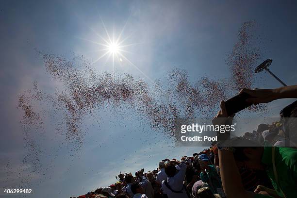 Balloons are released during a military parade to mark the 70th anniversary of the end of World War Two on September 3, 2015 in Beijing, China. China...