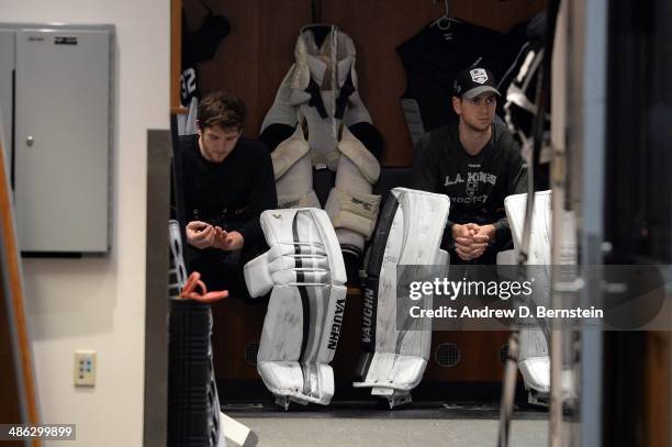 Goaltenders Jonathan Quick and Martin Jones of the Los Angeles Kings sit in the locker room before facing the San Jose Sharks in Game Three of the...