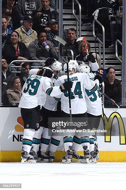 The San Jose Sharks celebrate against the Los Angeles Kings in Game Three of the First Round of the 2014 Stanley Cup Playoffs at Staples Center on...