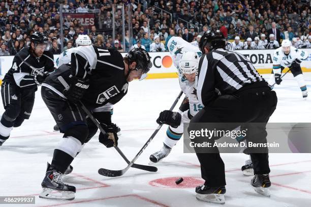 Anze Kopitar of the Los Angeles Kings faces off against Joe Thornton of the San Jose Sharks in Game Three of the First Round of the 2014 Stanley Cup...