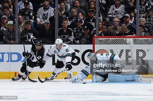 Antti Niemi of the San Jose Sharks blocks a shot on goal by Marian Gaborik of the Los Angeles Kings in Game Three of the First Round of the 2014...