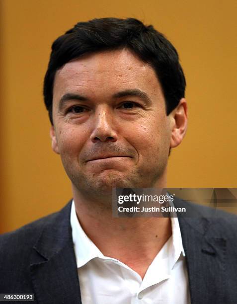 Economist and author Thomas Piketty speaks to the Department of Economics at the University of California, Berkeley on April 23, 2014 in Berkeley,...