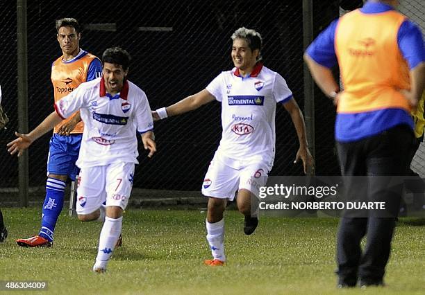 Paraguay's Nacional player Julian Benitez celebrates after scoring against Argentina's Velez Sarsfield during their Copa Libertadores football match...