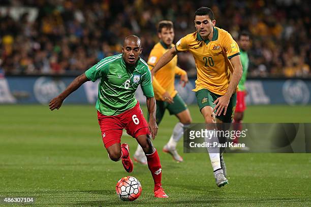 Bhuyan Jamal of Bangladesh controls the ball against Tom Rogic of Australia during the 2018 FIFA World Cup Qualification match between the Australian...