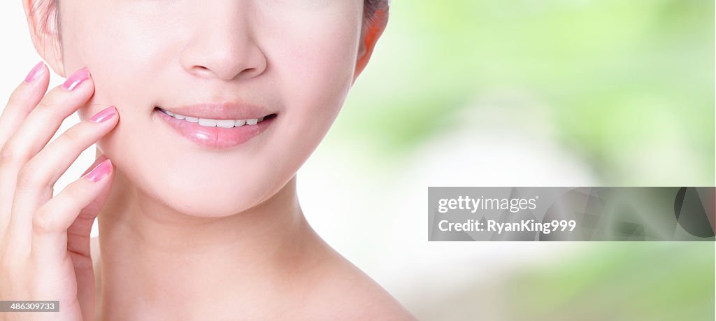 Woman smile lips with health teeth close up
