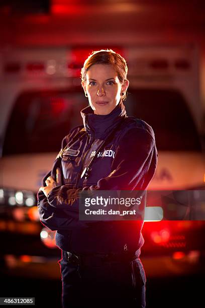 female paramedic - paramedic stock pictures, royalty-free photos & images