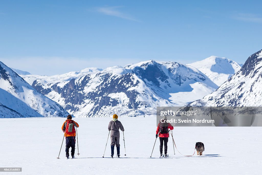Skiing at frozen lake in Norway