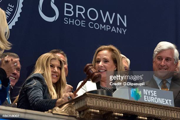 Fergie and Brown Shoe Company CEO, president and chairman Diane Sullivan celebrate Brown Shoe Company's 100 Years Of Listing at the New York Stock...