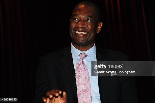 Legend Dikembe Mutombo of the Atlanta Hawks is honored by the Fulton County Commissioners at a press conference on September 1, 2015 at the Fulton...