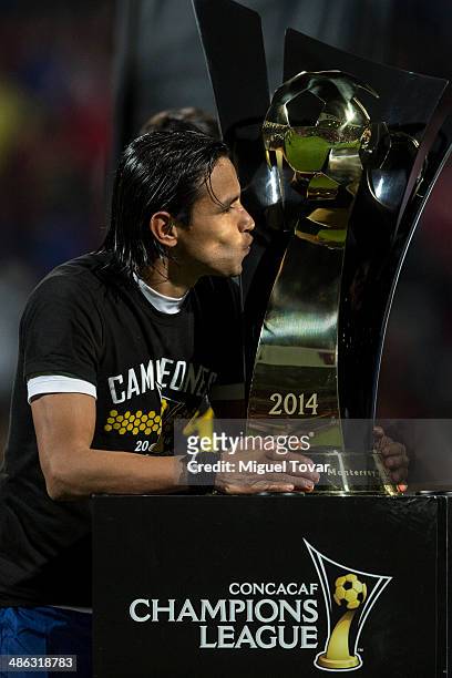 Gerardo Flores kisses the trophy after winning the leg 2 of the final match between Cruz Azul and Toluca as part of the CONCACAF Liga de Campeones at...