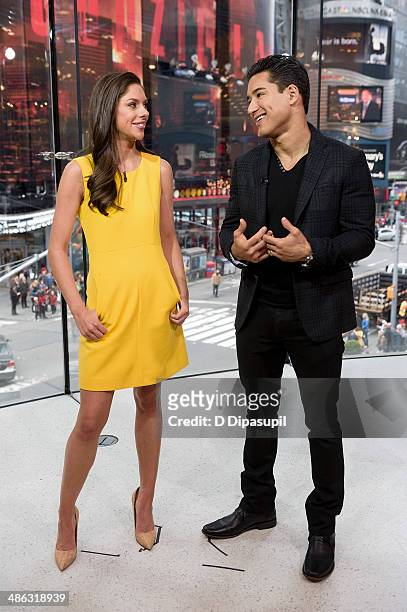 Mario Lopez interviews Abby Hunstman during her visit to "Extra" at their New York studios at H&M in Times Square on April 23, 2014 in New York City.