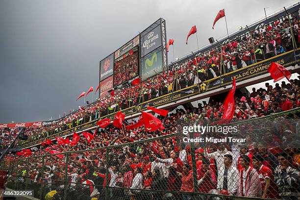 Fans of Toluca cheer for their team during the leg 2 of the final match between Cruz Azul and Toluca as part of the CONCACAF Liga de Campeones at...