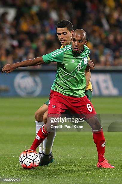 Bhuyan Jamal of Bangladesh controls the ball against Tom Rogic of Australia during the 2018 FIFA World Cup Qualification match between the Australian...