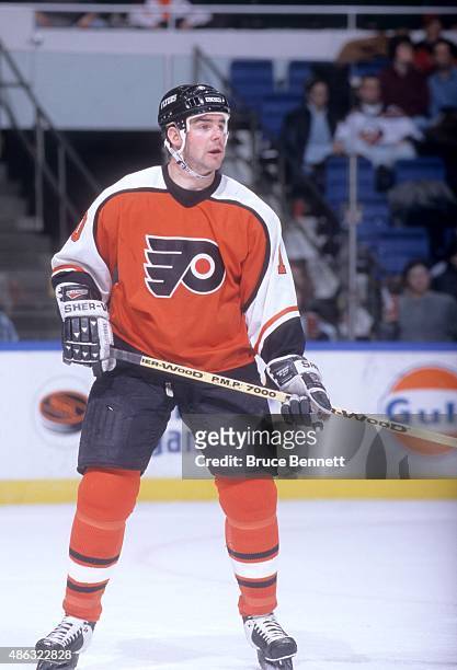 John LeClair of the Philadelphia Flyers skates on the ice during an NHL game against the New York Islanders on January 28, 1998 at the Nassau...