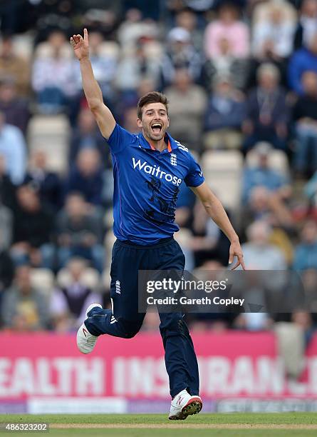 Mark Wood of England celebrates dismissing Glenn Maxwell of Australia during the 1st Royal London One-Day International match between England and...