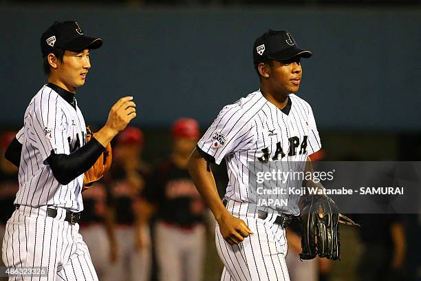 Outfielder Louis Okoye of Japan Celebrates after winning in the super round game between Japan v Canada during the 2015 WBSC U-18 Baseball World Cup...