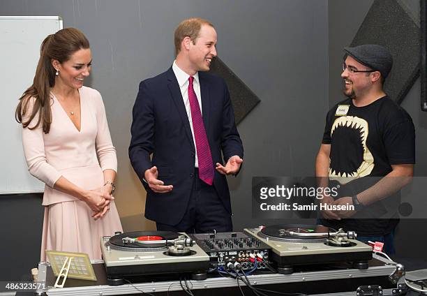Catherine, Duchess of Cambridge and Prince William, Duke of Cambridge play on DJ decks at the youth community centre, The Northern Sound System in...