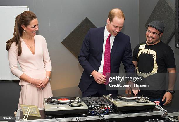 Catherine, Duchess of Cambridge and Prince William, Duke of Cambridge play on DJ decks at the youth community centre, The Northern Sound System in...