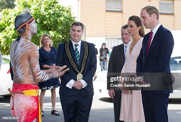 Prince William, Duke of Cambridge and Camilla, Duchess of Cambridge speak to performers at the community centre, The Northern Sound System in...