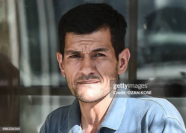 Abdullah Kurdi, father of three-year old Aylan Kurdi,waits at the morgue in Mugla, southern Turkey, on September 3 after a boat carrying refugees...