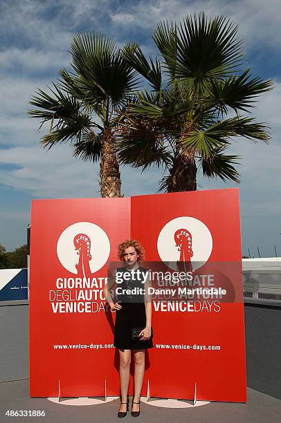 Julia Garner attends a photocall for 'Women's Tales' during the 72nd Venice Film Festival on September 3, 2015 in Venice, Italy.