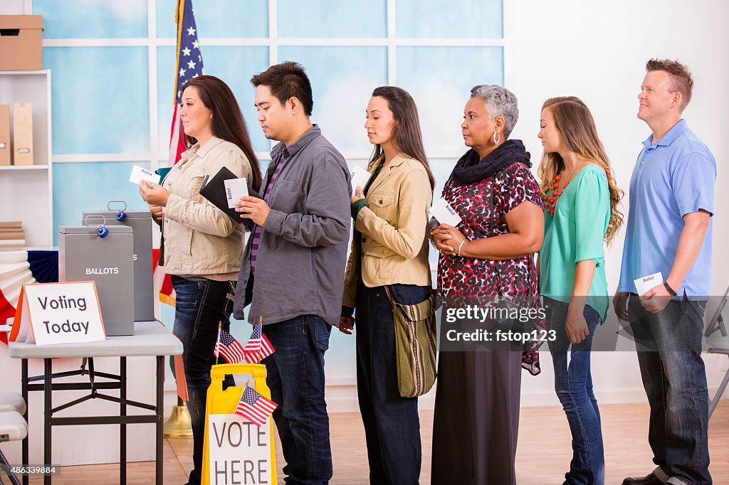 American voters stand in line to cast ballots. November elections.
