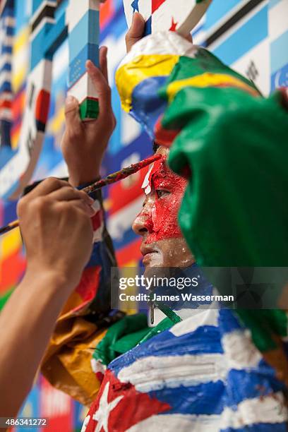 Liu Bolin creates art for the Global Goals campaign at Liu Bolin Studio August 28, 2015 in Beijing, China.