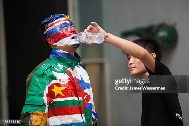 Liu Bolin creates art for the Global Goals campaign at Liu Bolin Studio August 28, 2015 in Beijing, China.