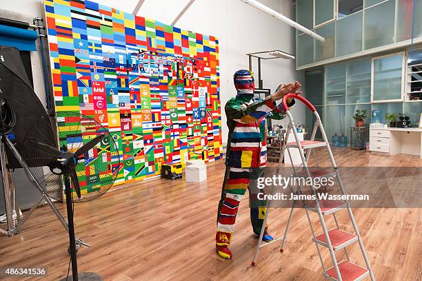 Liu Bolin creates art for the Global Goals campaign at Liu Bolin Studio August 28, 2015 in Beijing, China.