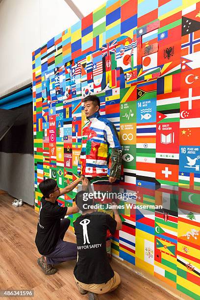 Liu Bolin creates art for the Global Goals campaign at Liu Bolin Studio August 28, 2015 in Beijing, China.