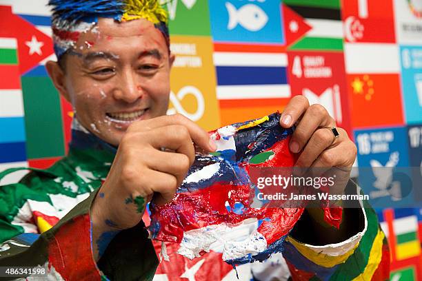 Liu Bolin creates art for the Global Goals campaign at Liu Bolin Studio August 28, 2015 in Beijing, China.