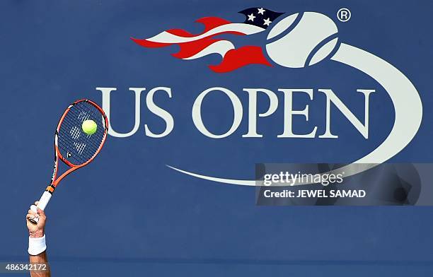 Stan Wawrinka of Switzerland returns to Hyeon Chung of South Korea during their 2015 US Open men's singles round 2 match at USTA Billie Jean King...