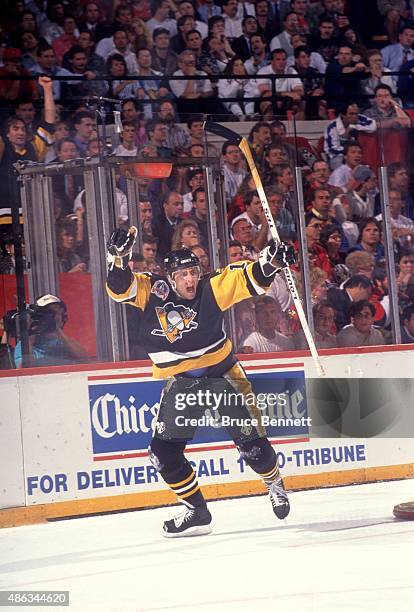 Ron Francis of the Pittsburgh Penguins celebrates after scoring the eventual game winning goal during Game 4 of the 1992 Stanley Cup Finals against...