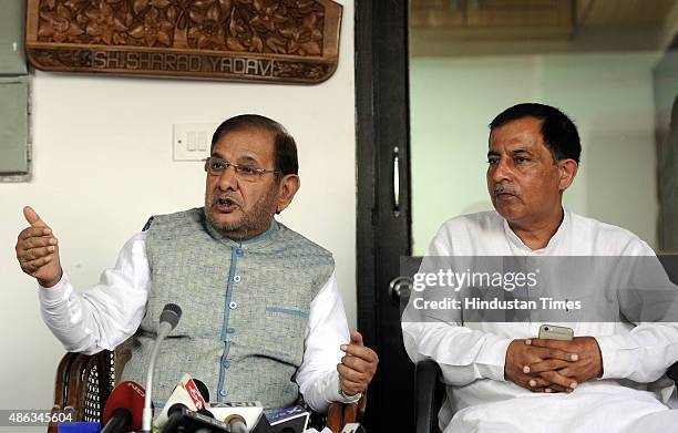 Party chief Sharad Yadav with JDU leader Rao Kamal Veer addressing press conference on the Bihar Elections and other Central Government issues at his...