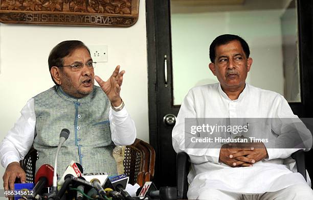 Party chief Sharad Yadav with JDU leader Rao Kamal Veer addressing press conference on the Bihar Elections and other Central Government issues at his...