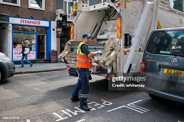 rubbish collection in st martin's lane, london - garbage collector stock pictures, royalty-free photos & images