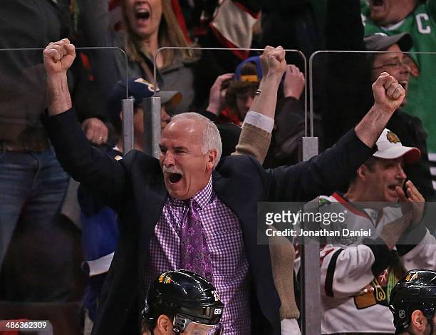 Head coach Joel Quenneville of the Chicago Blackhawks celebrates an overtime win against the St. Louis Blues in Game Four of the First Round of the...