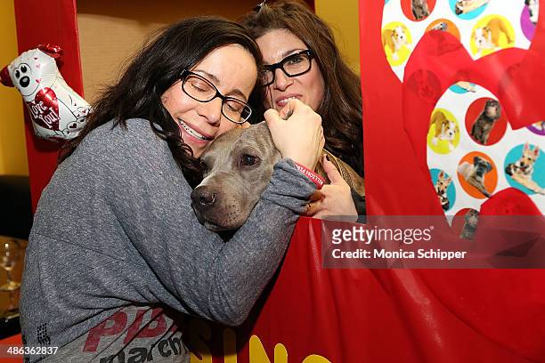 Janeane Garofalo poses with Angel at the 2014 Stand Up For Pits Benefit at Gotham Comedy Club on April 23, 2014 in New York City.
