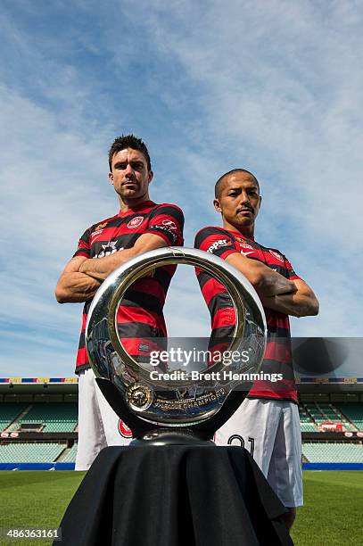 Shinji Ono and Michael Beauchamp of the Western Sydney Wanderers pose with the A-League Championship Trophy at Pirtek Stadium on April 24, 2014 in...