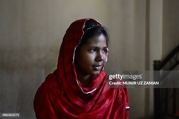 In this photograph taken on April 23 Bangladeshi garment worker Reshma Akter, who rescued after 17 days from the rubble of the collapsed Rana Plaza...