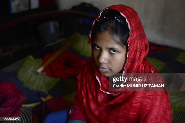 In this photograph taken on April 23 Bangladeshi garment worker Reshma Akter, who rescued after 17 days from the rubble of the collapsed Rana Plaza...