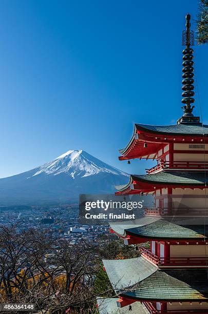 chureito peace pagoda, built on a hilltop facing mt. fuji - pagoda stock pictures, royalty-free photos & images