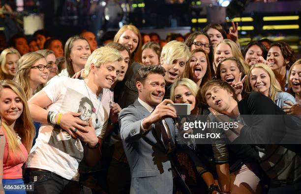 Host Ryan Seacrest and musicians Ross Lynch, Riker Lynch, Ellington Lee Ratliff, Rydel Lynch, Rocky Lynch of 'R5' in the audience at FOX's "American...