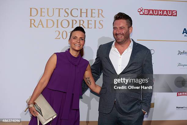 Julia Roentgen and Sasha poses during the Deutscher Radiopreis 2015 at Schuppen 52 on September 3, 2015 in Hamburg, Germany.