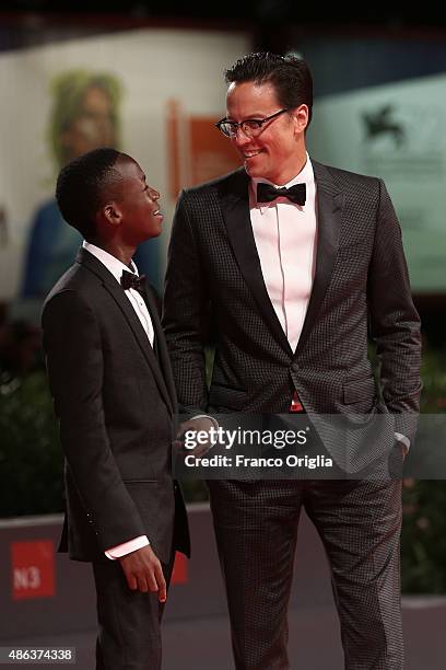 Actor Abraham Attah and director Cary Fukunaga attend the premiere of 'Beasts Of No Nation' during the 72nd Venice Film Festival on September 3, 2015...