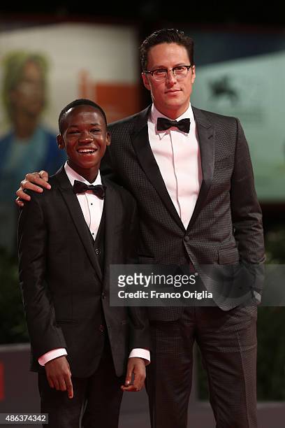 Actor Abraham Attah and director Cary Fukunaga attend the premiere of 'Beasts Of No Nation' during the 72nd Venice Film Festival on September 3, 2015...